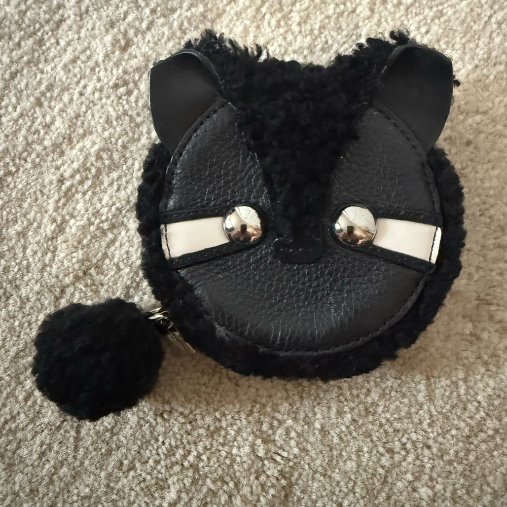 Rare Coach Black Cat/Raccoon coin purse.